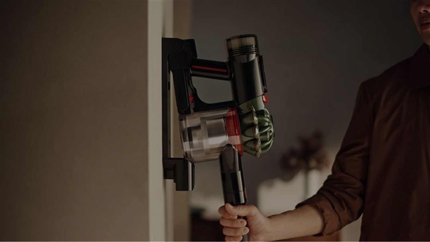 The Dyson V8 Cyclone cordless vacuum is being returned to its walk dok.